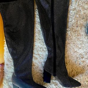 Over the knee sparkle boots.